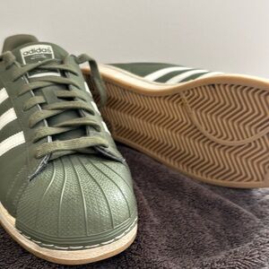 Super rare and unique Adidas Superstars in olive green size US 13